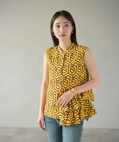 HERENCIA / Geometric ruffle sleeveless blouse