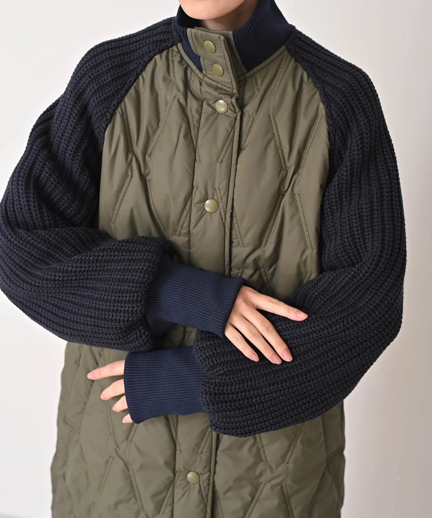 High neck quilted knit coat | HERENCIA(ヘレンチア